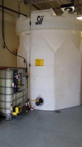 water treatment tank and tote setup